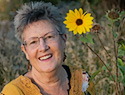 Colleen Crosson and sunflower